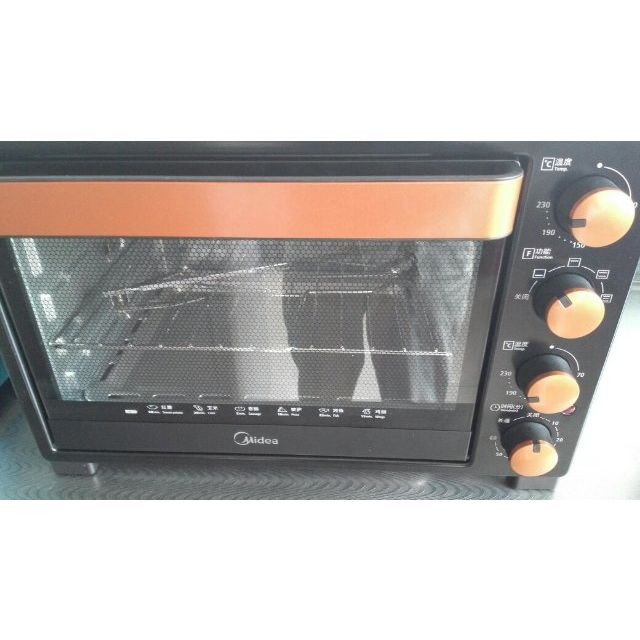 美的midea电烤箱35升四层烤位多层聚能面板内置接渣盘t3l326b