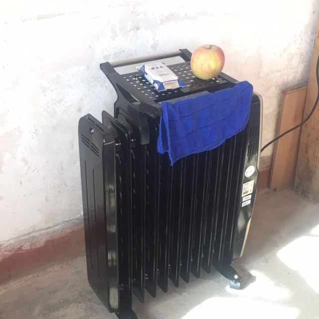 格力电暖器ndy07-21取暖器11片电热油汀升温快节能配加湿盒晾衣架