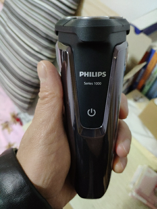 飞利浦(philips)电动剃须刀s1060玫瑰金 旋转式三刀头男士胡须刀 充电