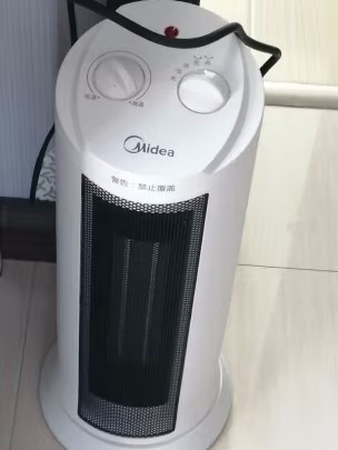 美的(Midea)取暖器 电暖器电暖气热风机塔式速热家用广角摇头暖风机暖风扇双档调节倾倒断电NTH20-17LW晒单图