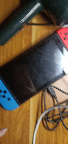 任天堂(Nintendo)Switch家用体感游戏机 掌上游戏机 续航增强 红蓝 日版晒单图