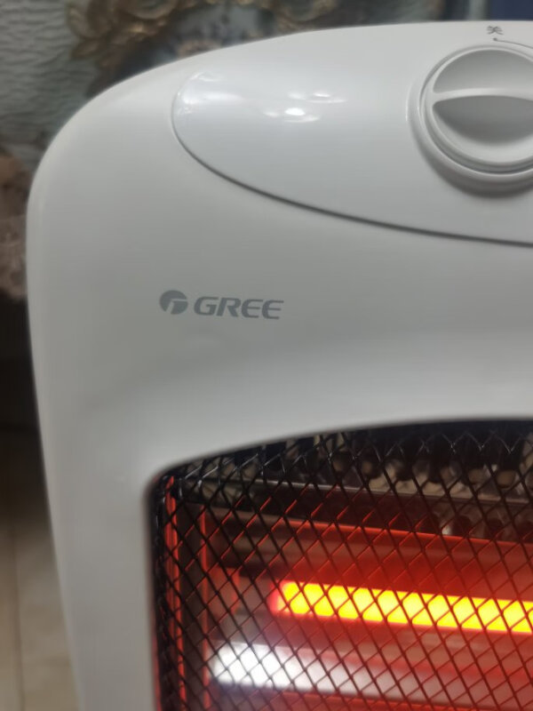 格力(GREE)小太阳取暖器NSD-12-WG家用办公室远红外电暖器速热防烫摇头节能暗光电暖气取暖炉 石英管加热倾倒断电晒单图