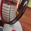 奥克斯小太阳取暖器家用节能暗光电暖器气升降立式热扇落地烤火炉摇头款晒单图