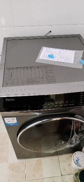 海尔(Haier)10公斤大容量 全自动滚筒洗衣机 洗干一体 洗烘一体机 智能投放 XQG100-HBD12206晒单图