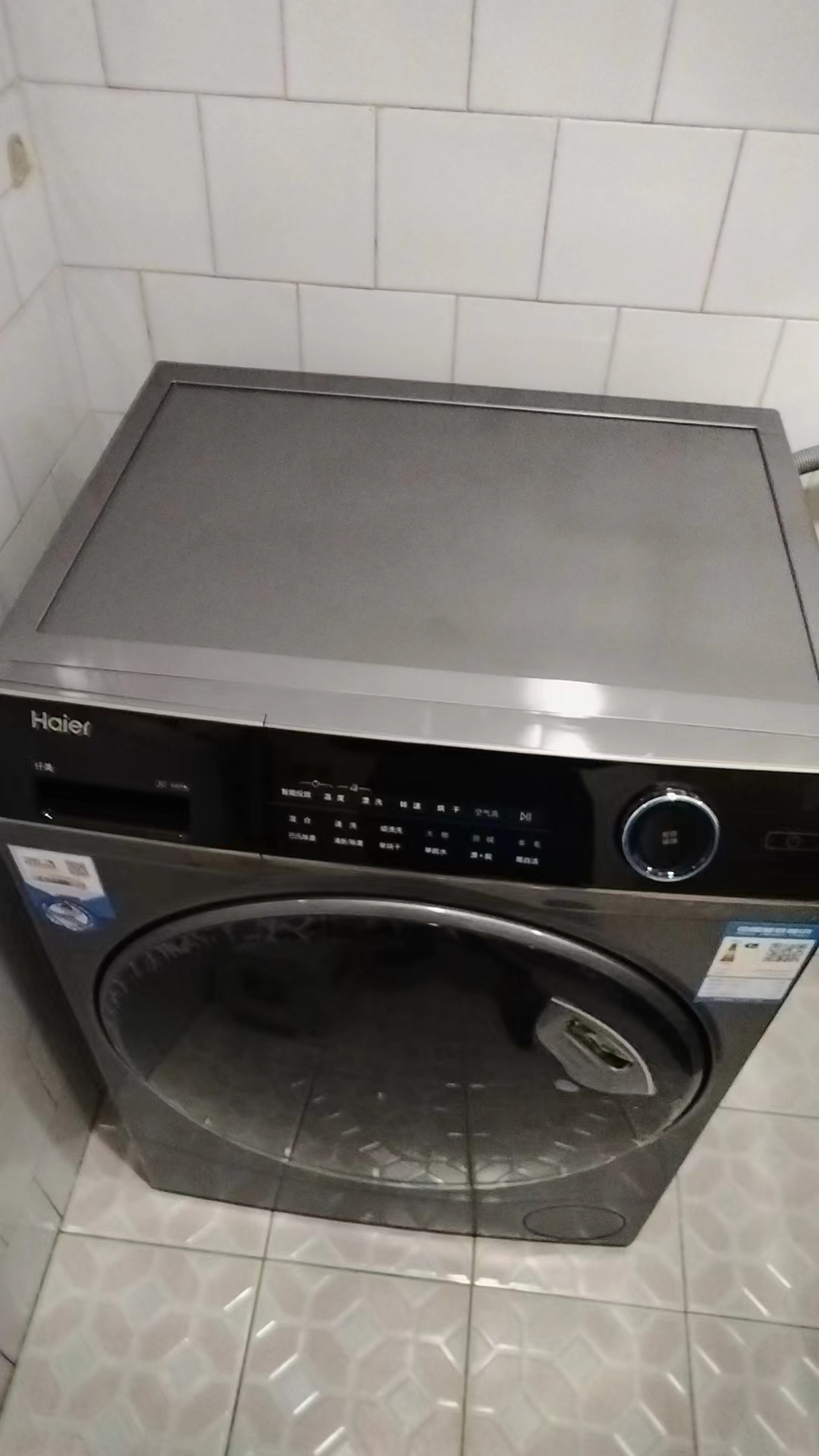 海尔(Haier) 9公斤 变频全自动 洗烘一体机 滚筒洗衣机 超薄 占地小 智能投放XQG90-HBD14126L晒单图