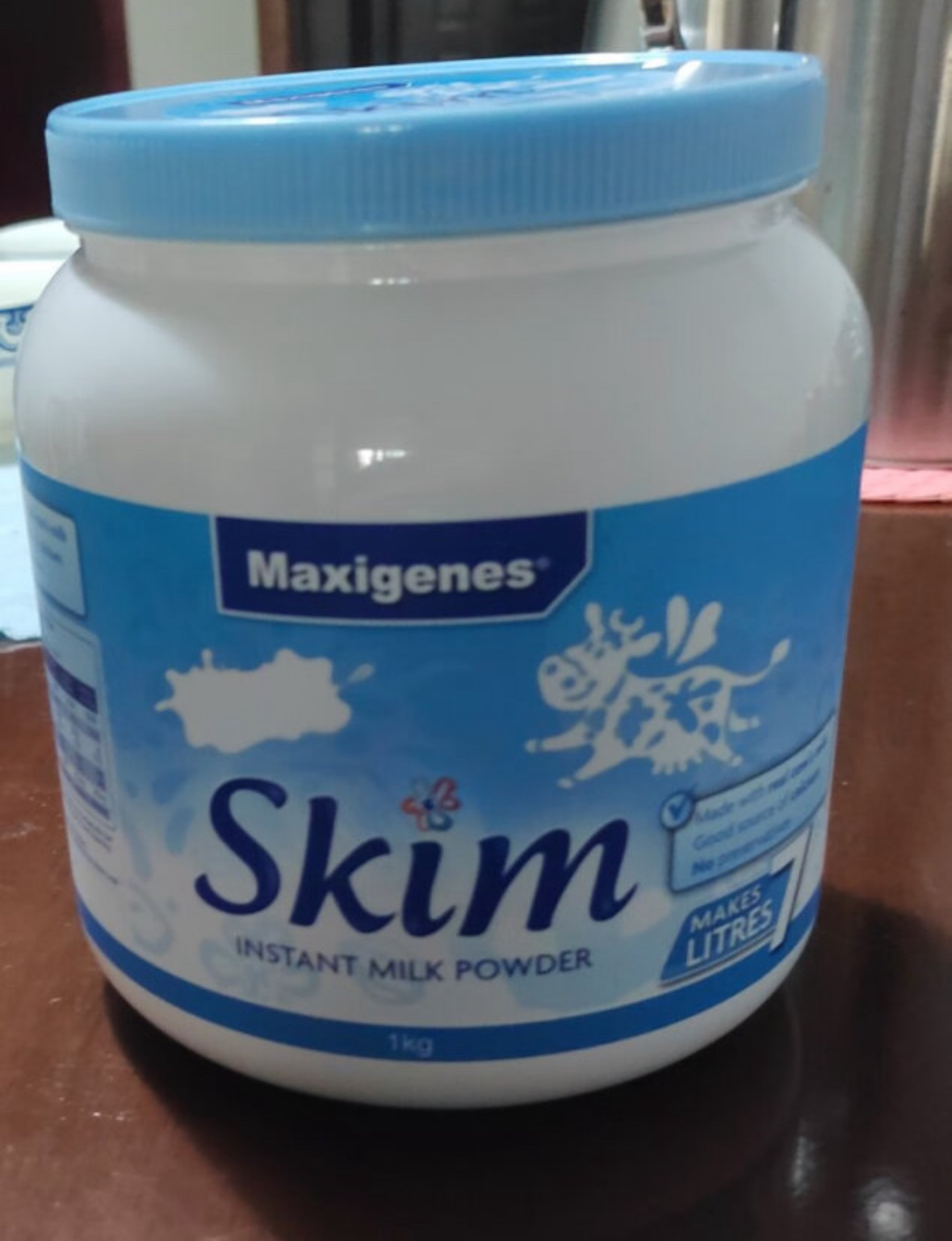 美可卓(Maxigenes)脱脂高钙成人奶粉 1kg/罐 进口奶粉 学生奶粉 蓝妹子 澳大利亚进口晒单图