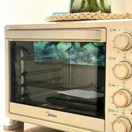 美的(Midea )电烤箱 家用台式 多功能 智能 全自动 25L大容量 控温 四层烤位 烘烤箱PT25X1晒单图