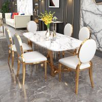 北欧轻奢风格大理石餐桌椅组合不锈钢现代简约小户型家用方形餐桌