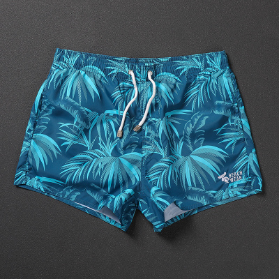 盖浪国潮三分沙滩裤男蓝色热带植物度假短裤可下水游泳泡温泉裤衩
