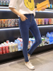 希娅牛仔裤女蓝色高腰显瘦小脚裤修身排扣学生铅笔长裤XD2014