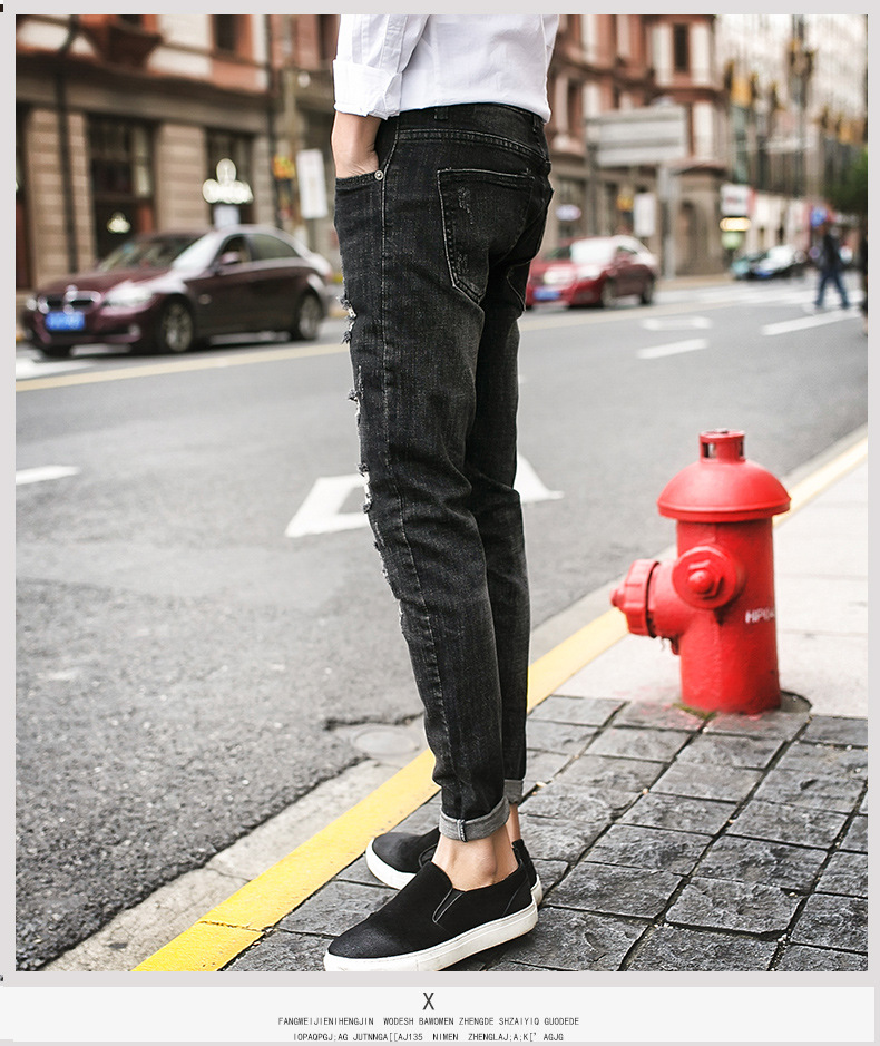 春装黑色破洞补丁牛仔裤男修身小脚裤韩版潮流