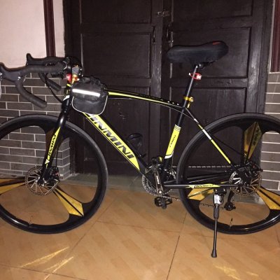 金米尼自行车 包邮 21/24速26寸公路车通勤一体轮双碟刹700c赛车男士