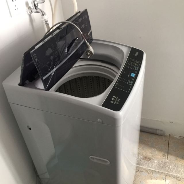 海尔(haier)xqb70-m12699x 新品上市7公斤全自动波轮洗衣机(月光灰)