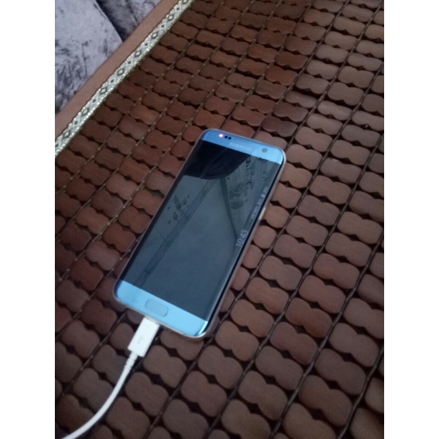 三星samsunggalaxys7edge美版官换单卡手机32gb珊瑚蓝色