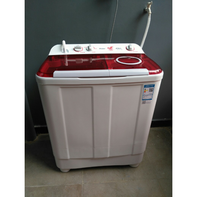haier 海尔洗衣机 xpb90-1127hs 9公斤半自动波轮洗衣机红白家用双缸