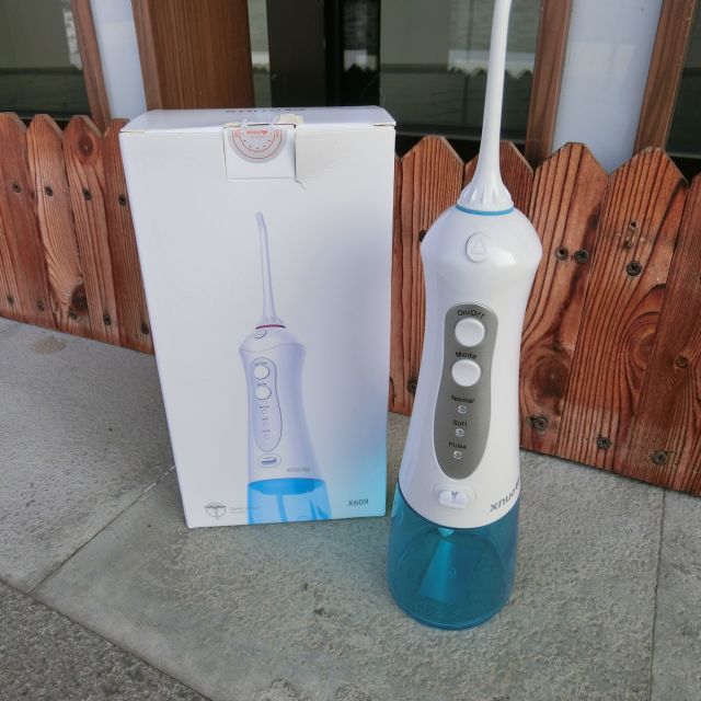 美国心诺xnuo冲牙器水牙线便携式洁牙器家用洗牙器电动牙结石机器