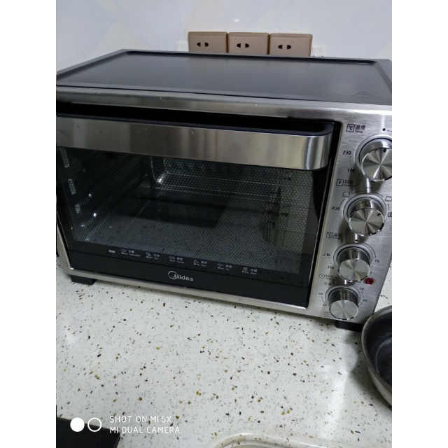 美的电烤箱使用说明(美的电烤箱使用说明书T1108B)