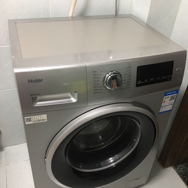 海尔haierxqg70127197公斤全自动家用滚筒洗衣机时间洗烫烫净中途添衣