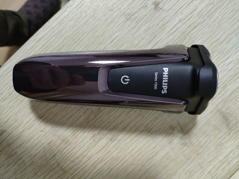 飞利浦(philips)电动剃须刀s1060玫瑰金 旋转式三刀头男士胡须刀 充电