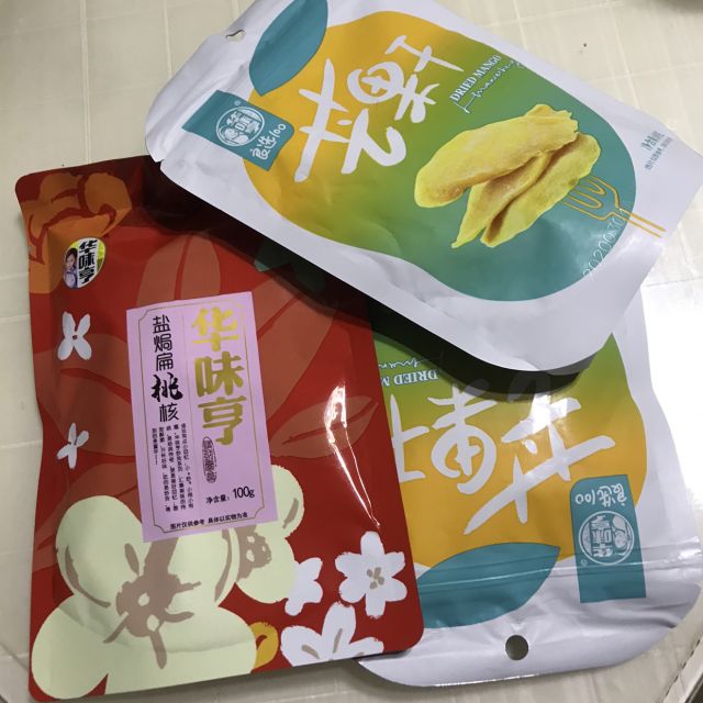 69元任选10件华味亨芒果干100g袋风味水果干果脯零食芒果片蜜饯果干