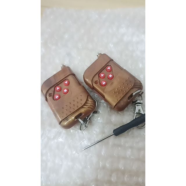 通用对拷贝电动车库门遥控器道闸伸缩门卷帘门钥匙433433桃木