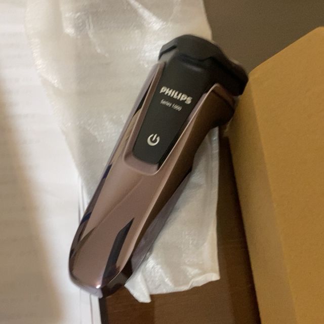 飞利浦(philips)电动剃须刀s1060玫瑰金 旋转式三刀头男士胡须刀 充电