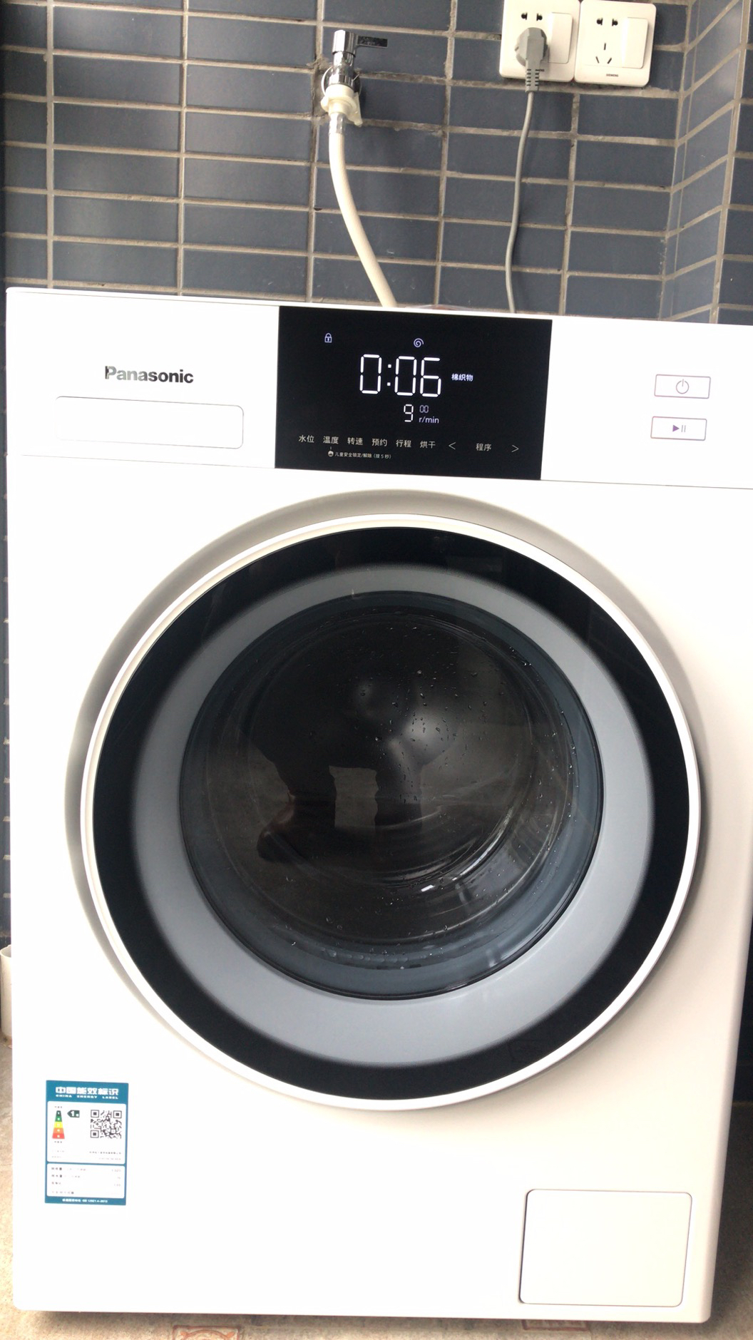 松下(panasonic) 10kg全自动家用变频洗烘一体机滚筒洗衣机 xqg100-ng