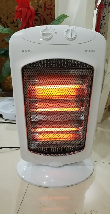 格力(gree)取暖器nsd-12-wg 石英管发热 摇头送暖 节能暗光不伤眼