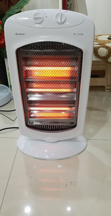 格力(gree)取暖器nsd-12-wg 石英管发热 摇头送暖 节能暗光不伤眼