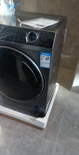 海尔(Haier)纤美超薄款滚筒洗衣机全自动变频 洗烘一体超薄洗衣机 智能投放 双喷淋525大筒径 9公斤晒单图