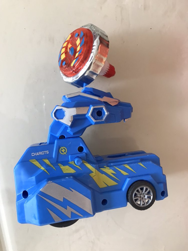 拓斯帝诺新奇陀螺暴龙战车玩具发光儿童男女孩子3-10岁旋转发射器对