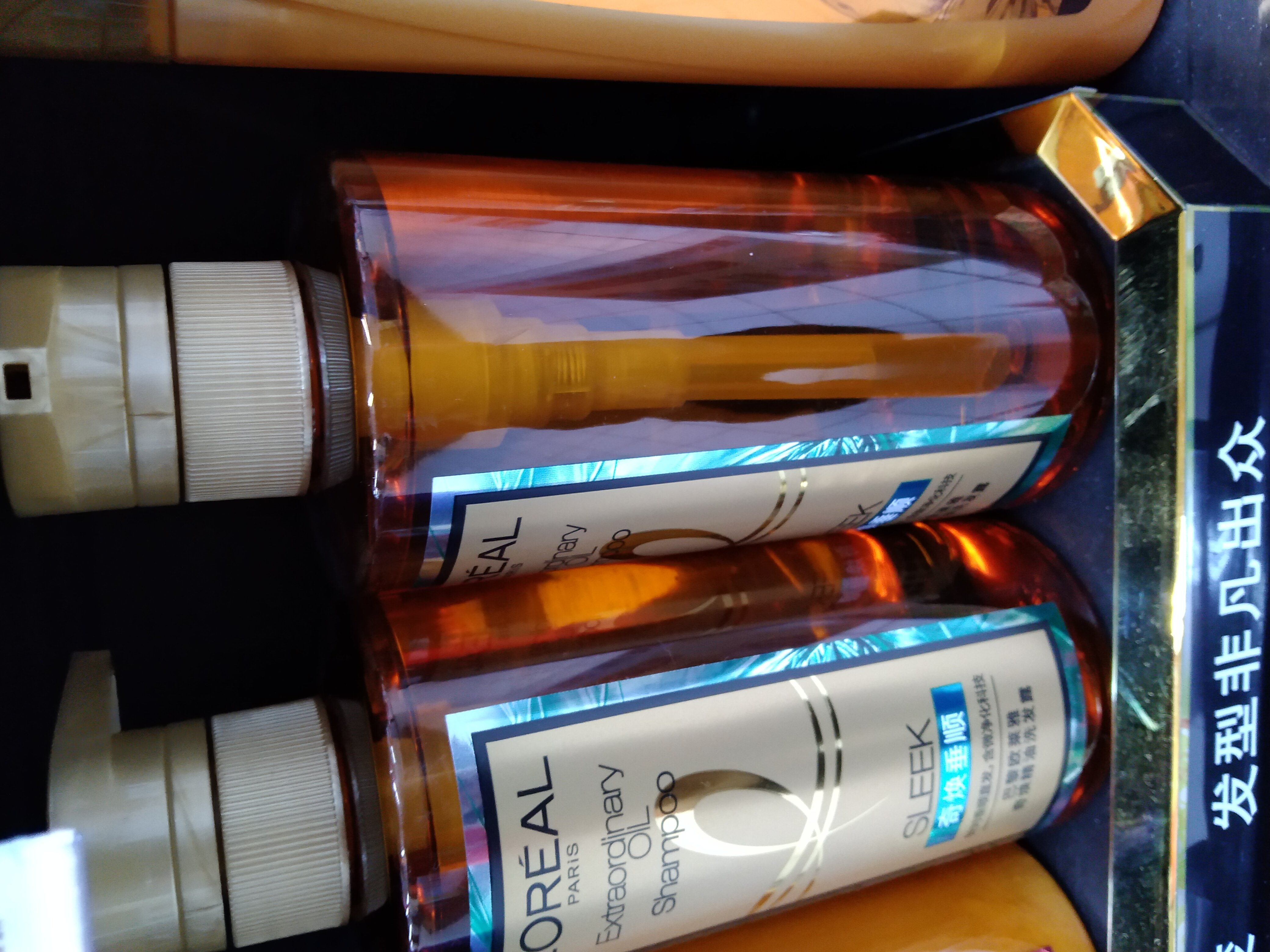 欧莱雅(LOREAL)奇焕精油洗发露(奇焕垂顺) 440ml(新老包装随机发货)晒单图