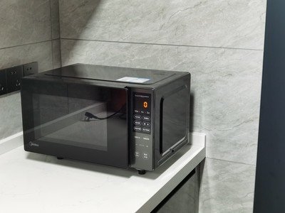 美的(Midea) 微波炉家用 800W平板速热 微波杀菌 智能变频 PM20M3 20L 黑色 容量20L晒单图