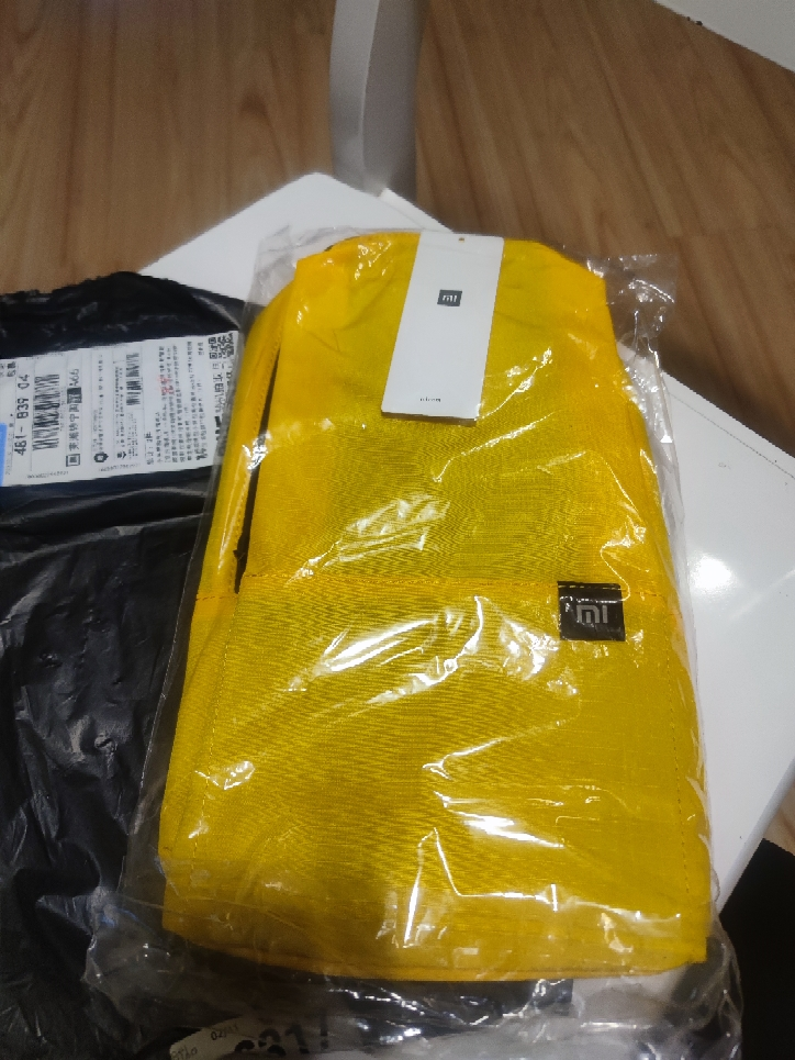 小米双肩包小背包男女通用运动包日常休闲双肩包学生书包旅行包黄色7l