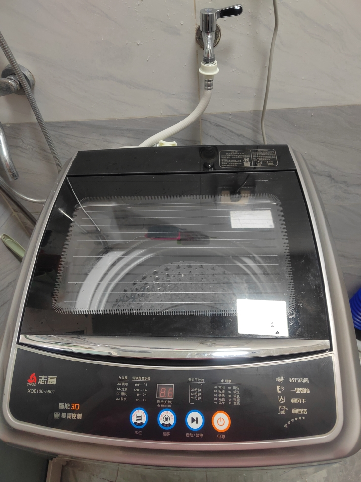 志高(CHIGO)XQB100-5801 10公斤 洗烘一体全自动洗衣机 波轮洗衣机 强力电机 喷淋漂洗晒单图