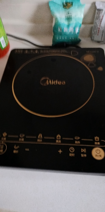 美的(Midea)电磁炉C21-WK2102大功率火锅炉8档多功能智能家用触控式电磁灶一键爆炒(汤锅+炒锅)晒单图
