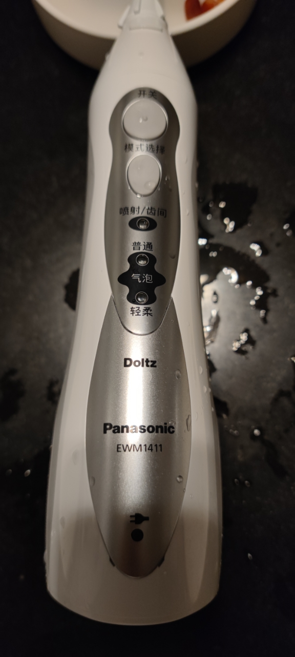 松下(Panasonic)电动冲牙器 洗牙器 水牙线 牙齿清洁器 口腔冲洗器 正畸便携洁牙器EWM1411晒单图