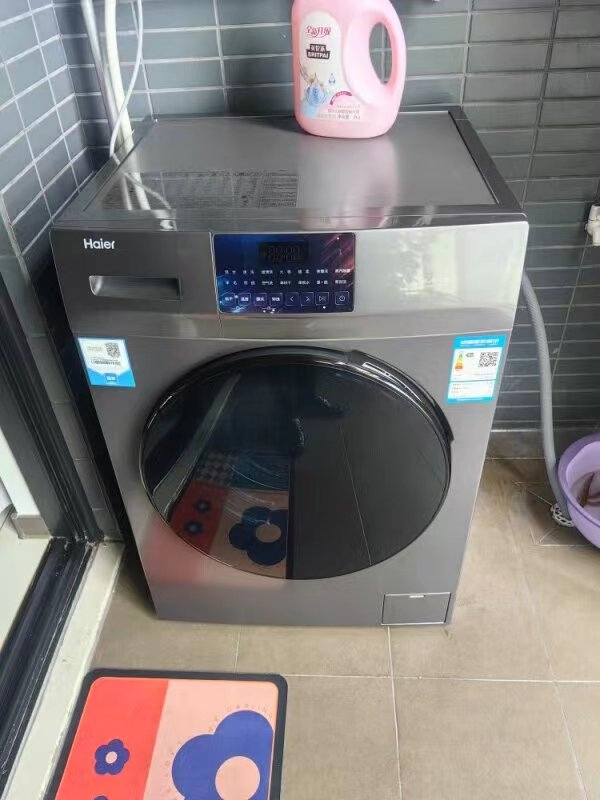 海尔(Haier)10公斤全自动滚筒洗衣机变频洗烘一体家用大容量防生锈空气洗智能烘干除菌螨洗衣机XQG100-HB06晒单图
