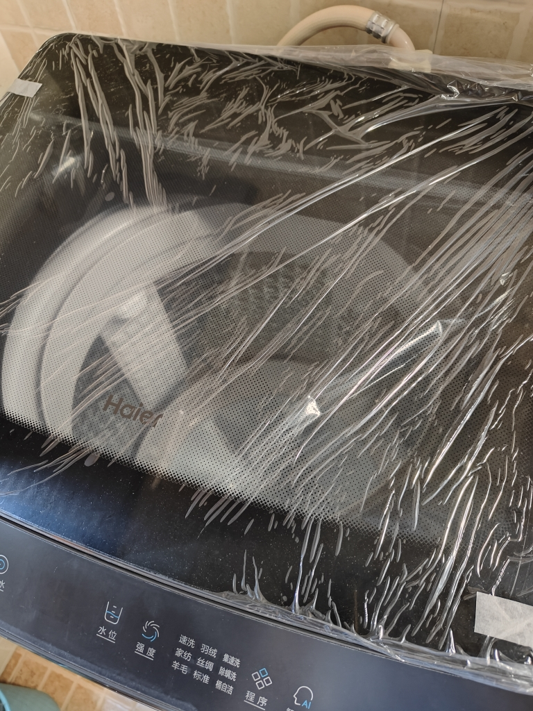 海尔(Haier)双动力防缠绕波轮洗衣机全自动 直驱变频10公斤 洗脱一体 自编程 除螨波轮洗衣机 LED晶彩触摸屏晒单图