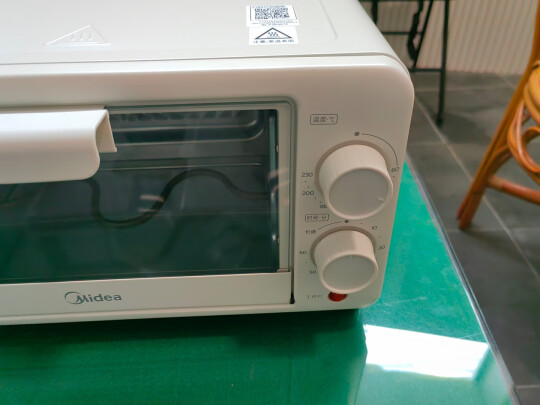 美的(Midea) 电烤箱PT35A0家用小型全自动烘焙多功能 35L大容量四层烤位 台式60min精准定时广景大视窗晒单图