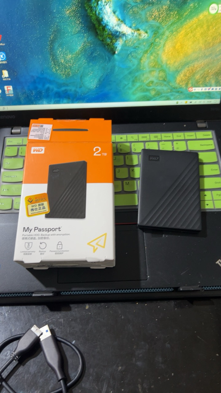 西部数据(WD)2TB USB3.0移动硬盘My Passport随行版 2.5英寸 黑色(密码保护 自动备份)晒单图