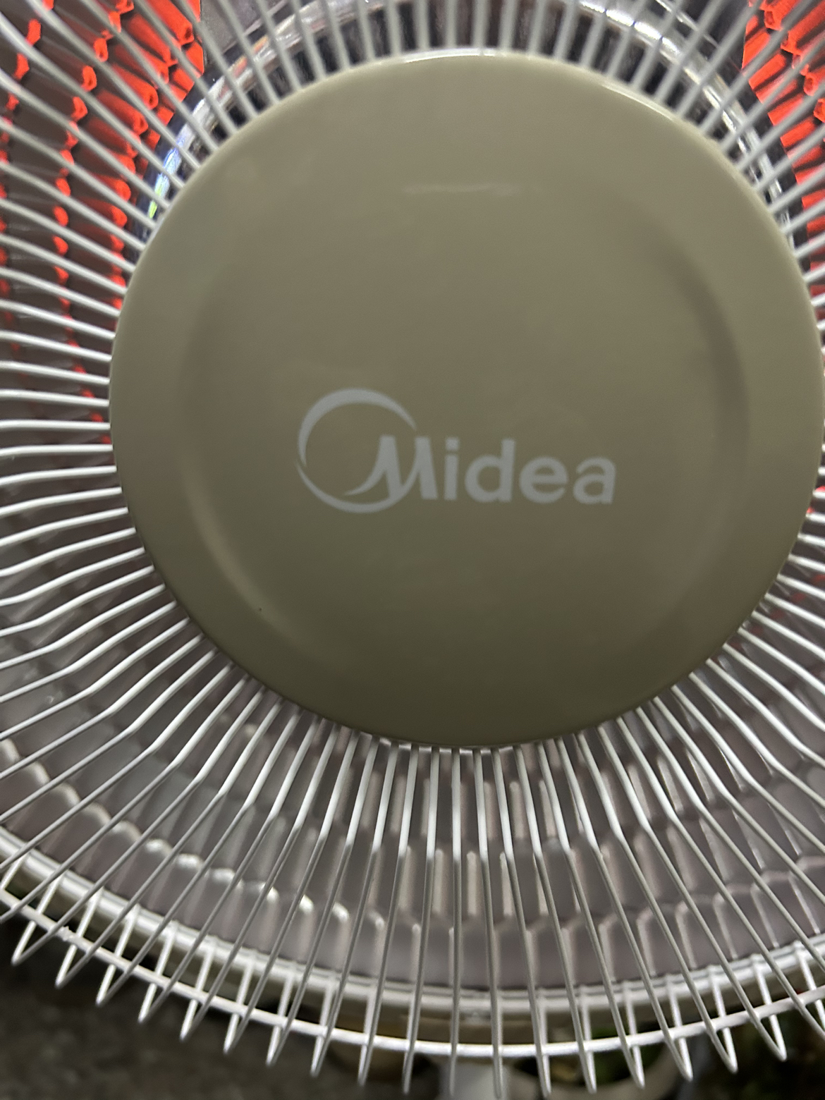 美的(Midea)小太阳取暖器NPS10-15B家用小暖阳电热扇取暖气立式节能省电远红外烤火炉摇头升降电暖器(线下同款)晒单图