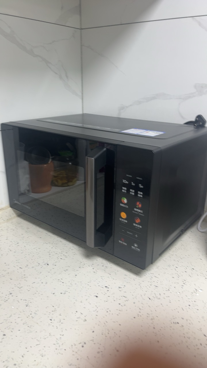 美的(Midea)23年升级款微碳系列微波炉烤箱一体机平板光波速热23L容量变频臻彩荧幕(C32)晒单图