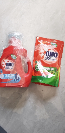 奥妙(OMO) 深层洁净洗衣液 1kg+400g 源自天然酵素 含衣领净成分(新老包装随机发货)[联合利华]晒单图