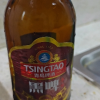 青岛啤酒TSINGTAO)黑啤枣味12度296ml*8瓶晒单图