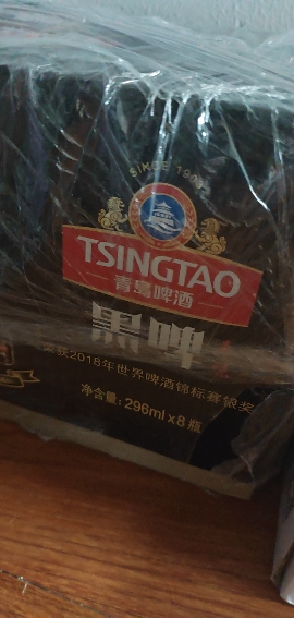 青岛啤酒TSINGTAO)黑啤枣味12度296ml*8瓶晒单图