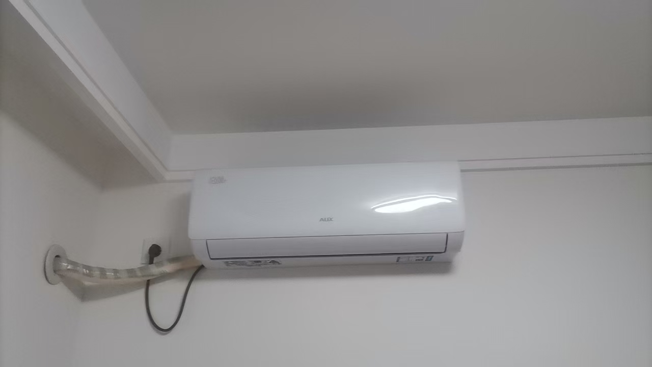 奥克斯(AUX)1.5匹P新一级能效 变频冷暖自清洁家用卧室壁挂式空调挂机 KFR-35GW/BpR3AQJ18(B1)晒单图