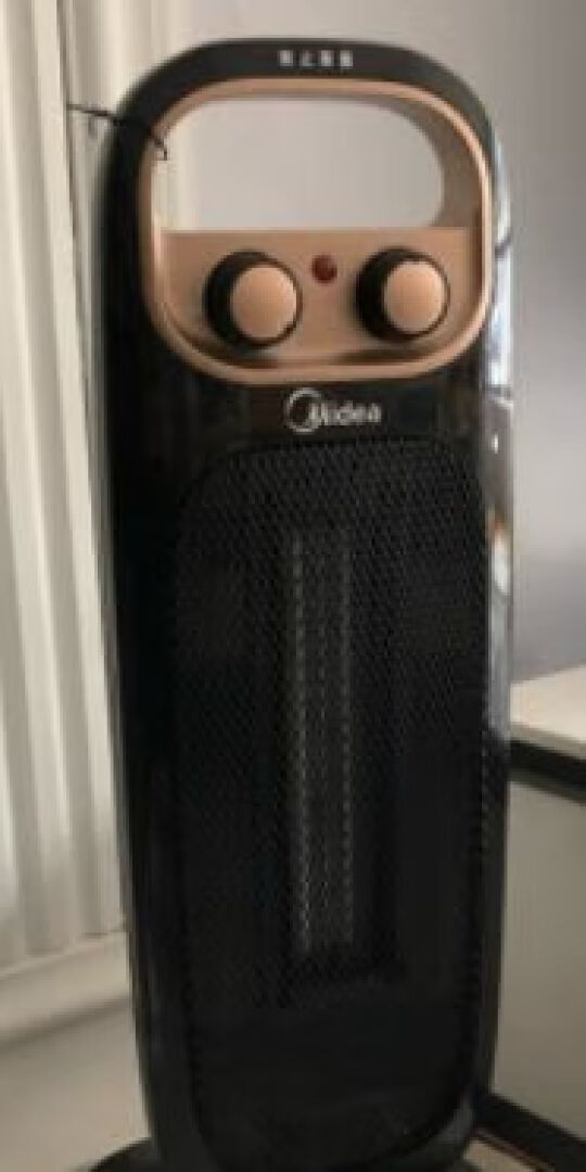 美的(Midea)电暖风机NTH20-15B电暖器轻音低噪塔式小太阳速热取暖器家用电暖炉暖气摇头办公 (线下同款)晒单图