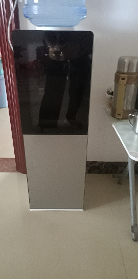 [店长推荐]美的(Midea)饮水机家用桶装水立式办公温热型饮水器烧水制热双门防尘 YR1002S-X晒单图
