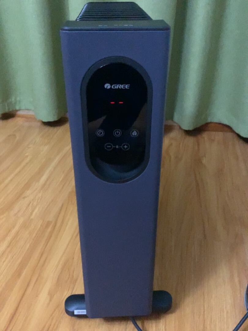 格力(GREE)电油汀取暖家电暖气片加宽13片油汀电热油汀加热石墨烯取暖器家用电暖器 NY23-X6022B晒单图